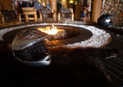 Shoei Helmets basking in the warm glow of a fire